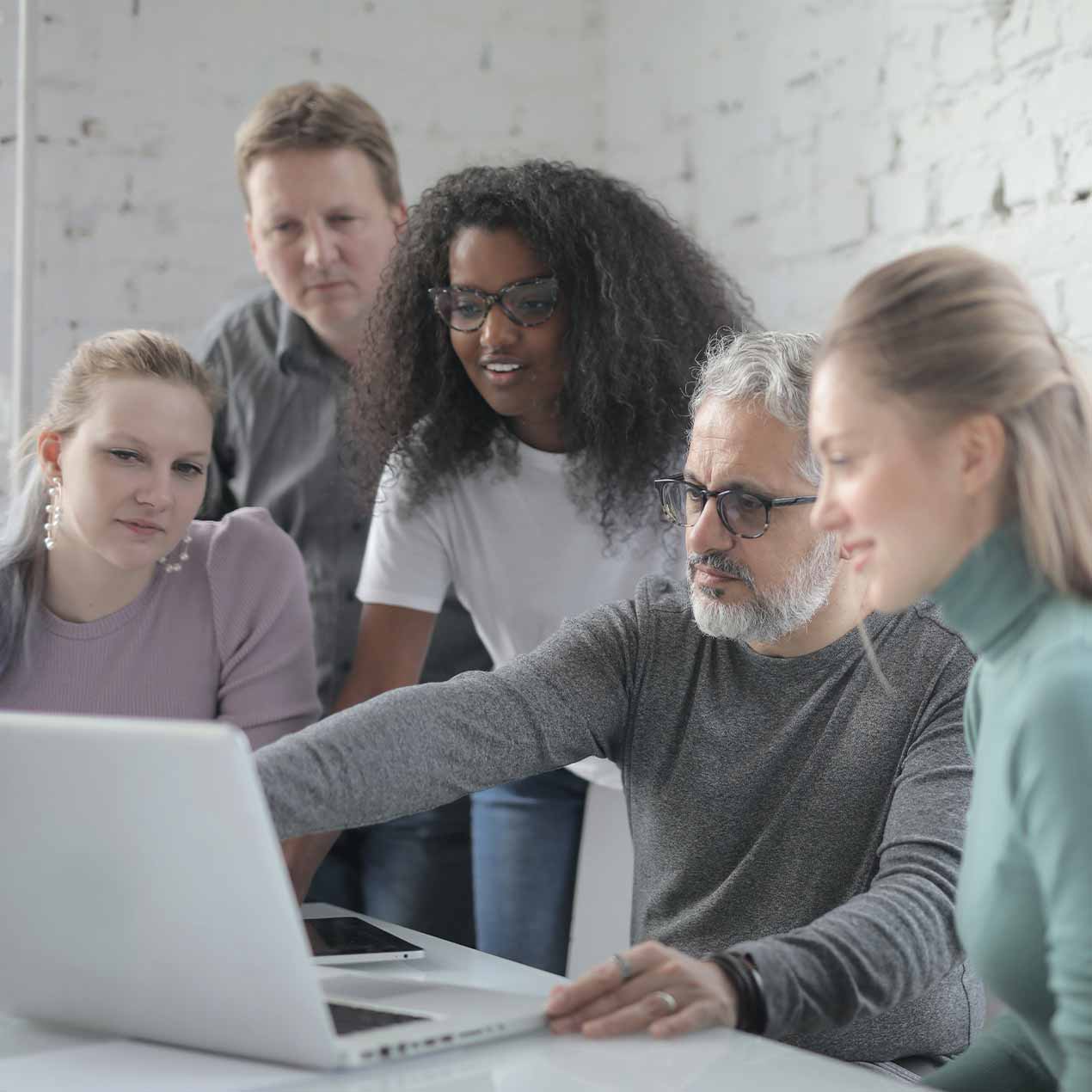 Tracy Adkins Consultants Consultants analyzing client accounts